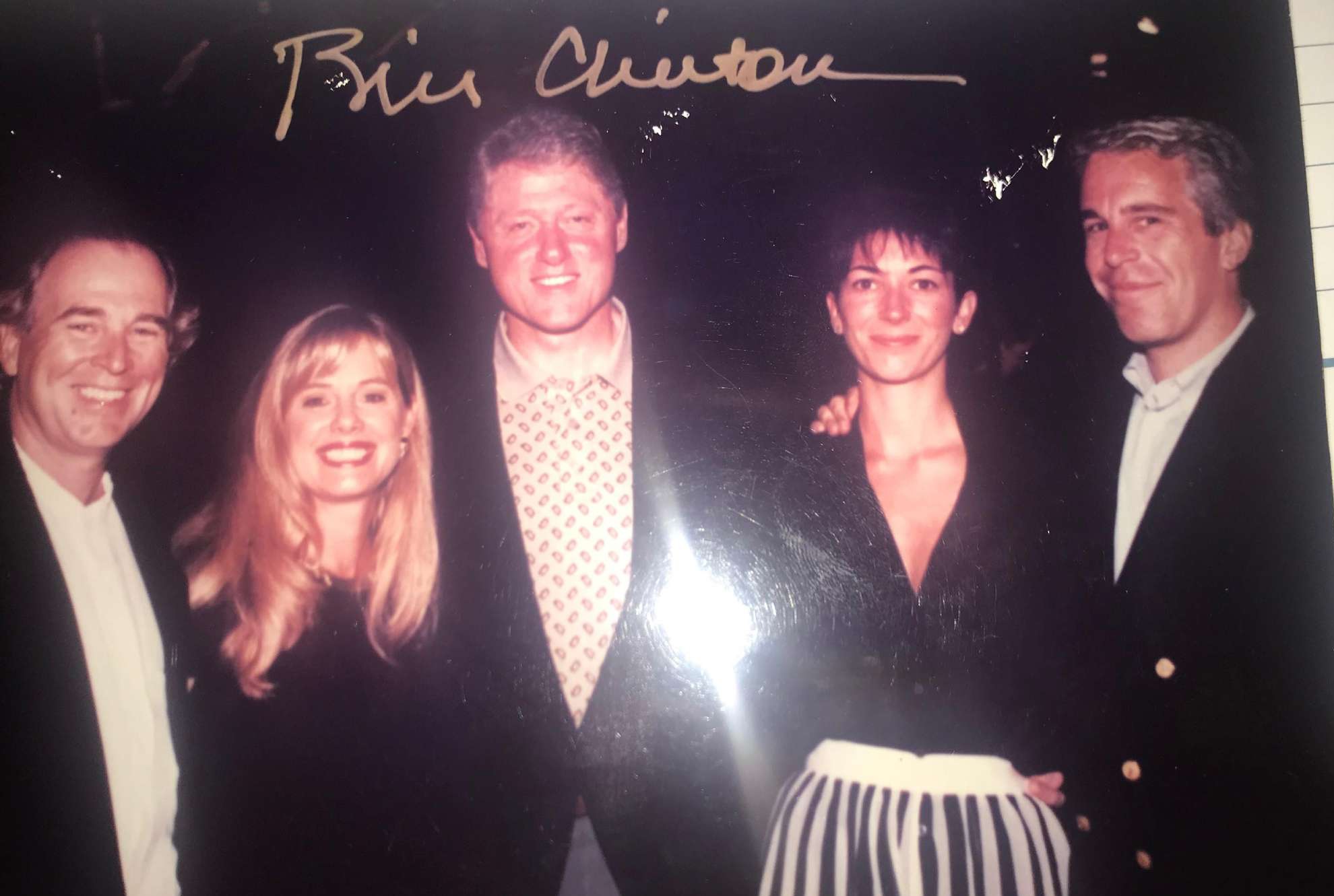 Bill Clinton with Epstein and Ghislaine Maxwell, alongside another couple.